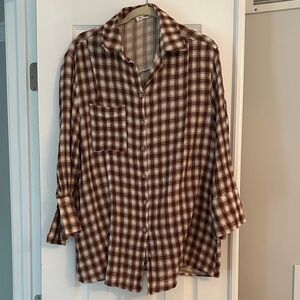 Burgundy quarter length sleeve plaid button down top